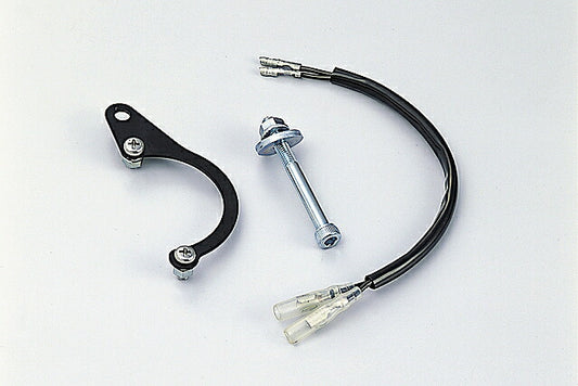 Horn Relocation Stay, Black. Required when replacing headlights. Ape 50 (-'07)/100