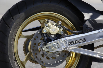 R Caliper Support Brembo 2P Up-Mount GROM 13-24 Black Anodized Finish, 1 pc.