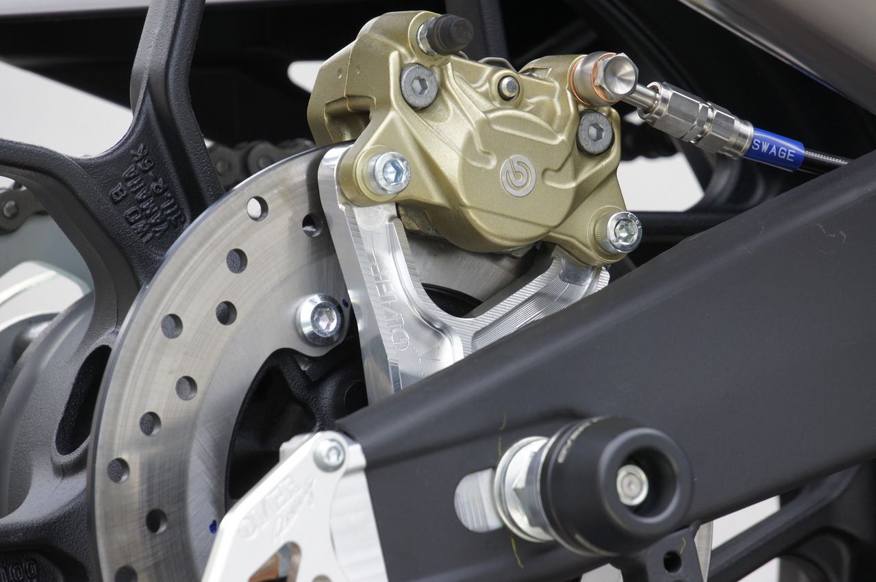 Rear caliper support for Brembo 2-pot (crab) calipers, YZF-R25, silver anodized finish, 1 pc.